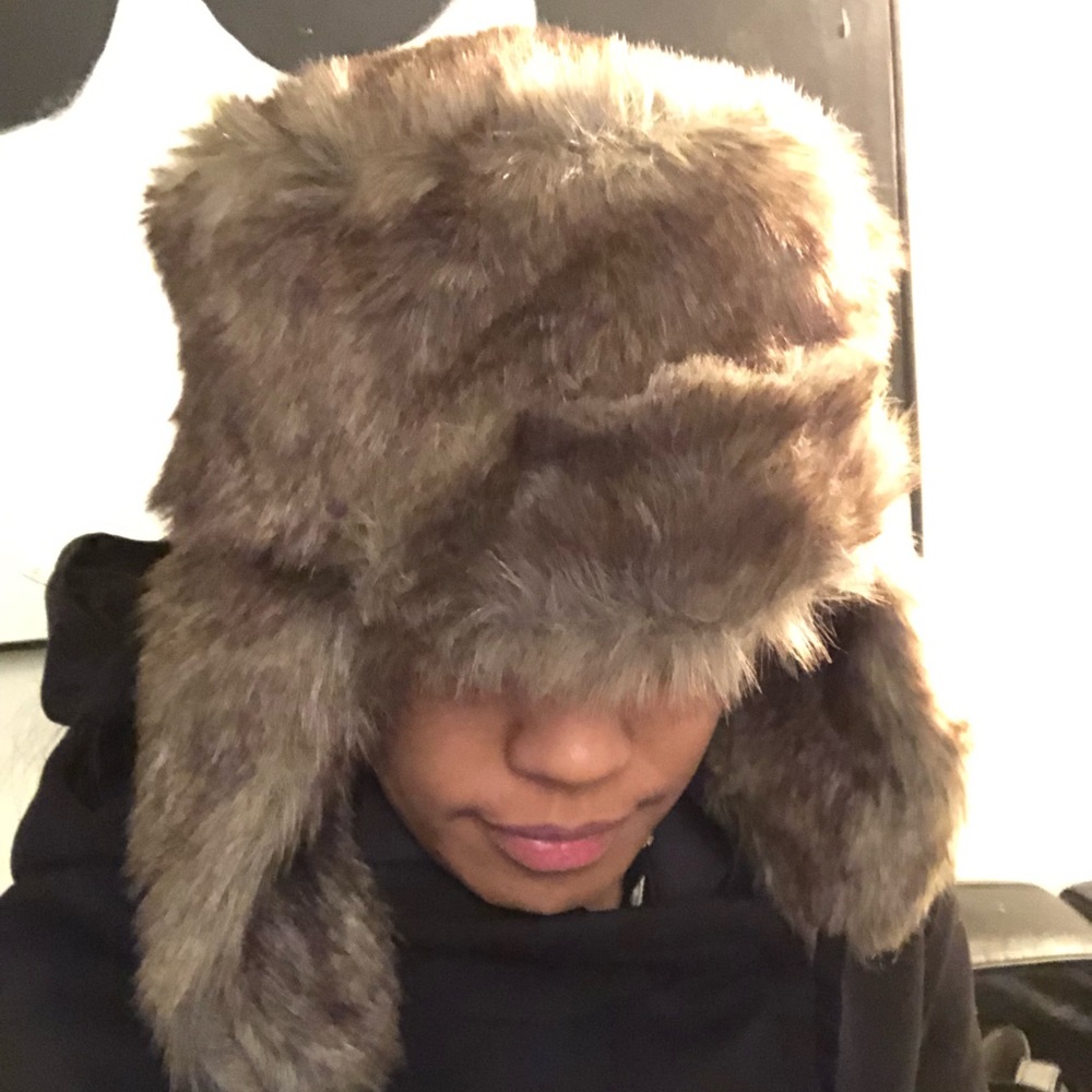 Furry Winter fashion hat with earflaps.